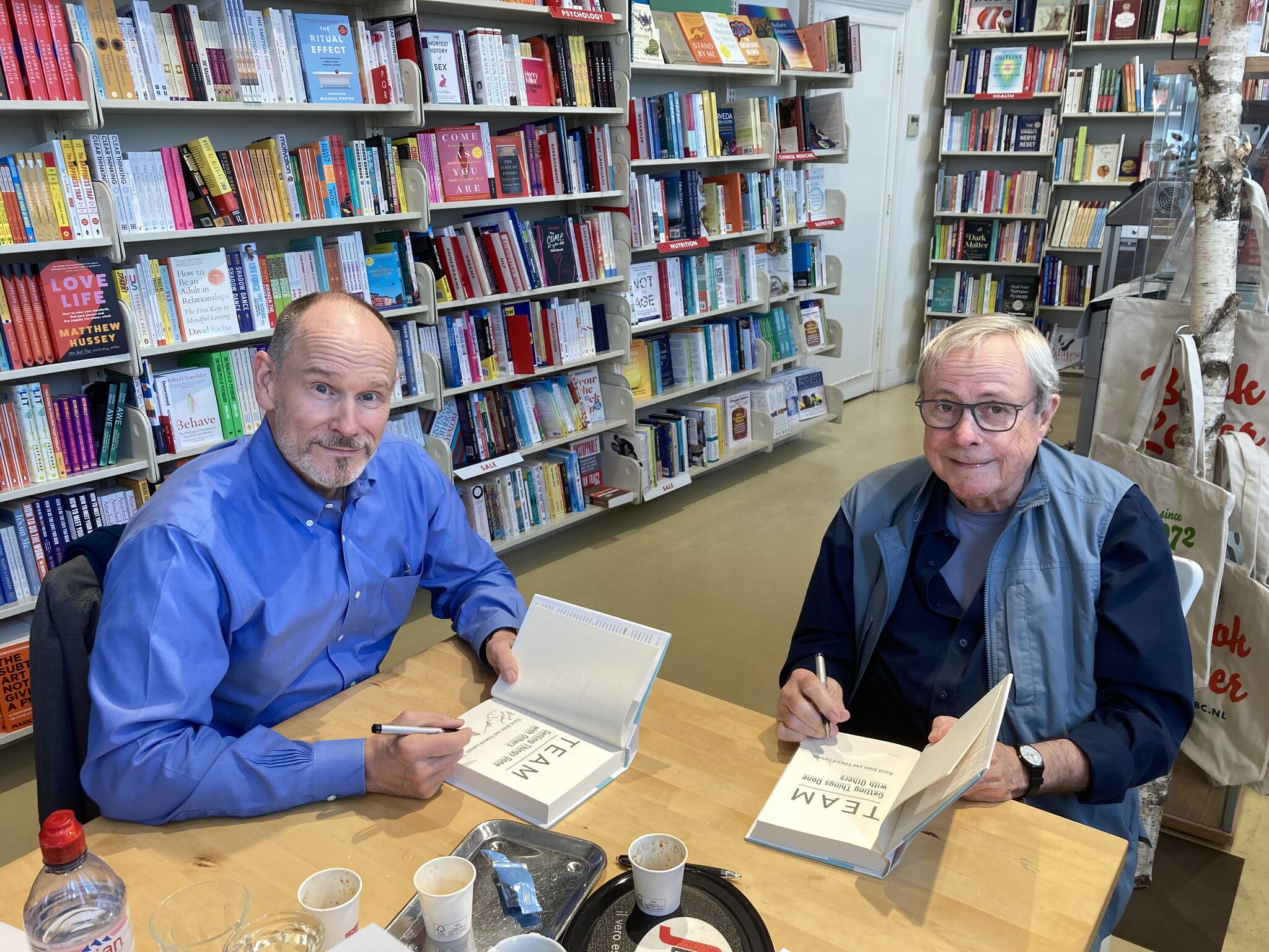 LinkedIn post image: Signing w/my co-auther, Ed Lamont, our new book--for potentially grateful readers.