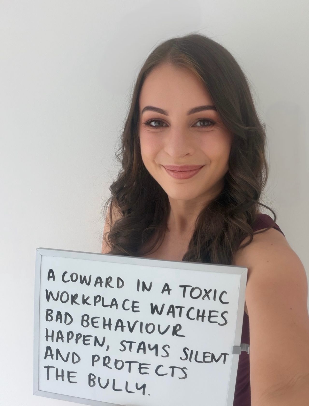 LinkedIn post image: A coward in a toxic workplace watches bad behaviour, stays silent and protects the bully.